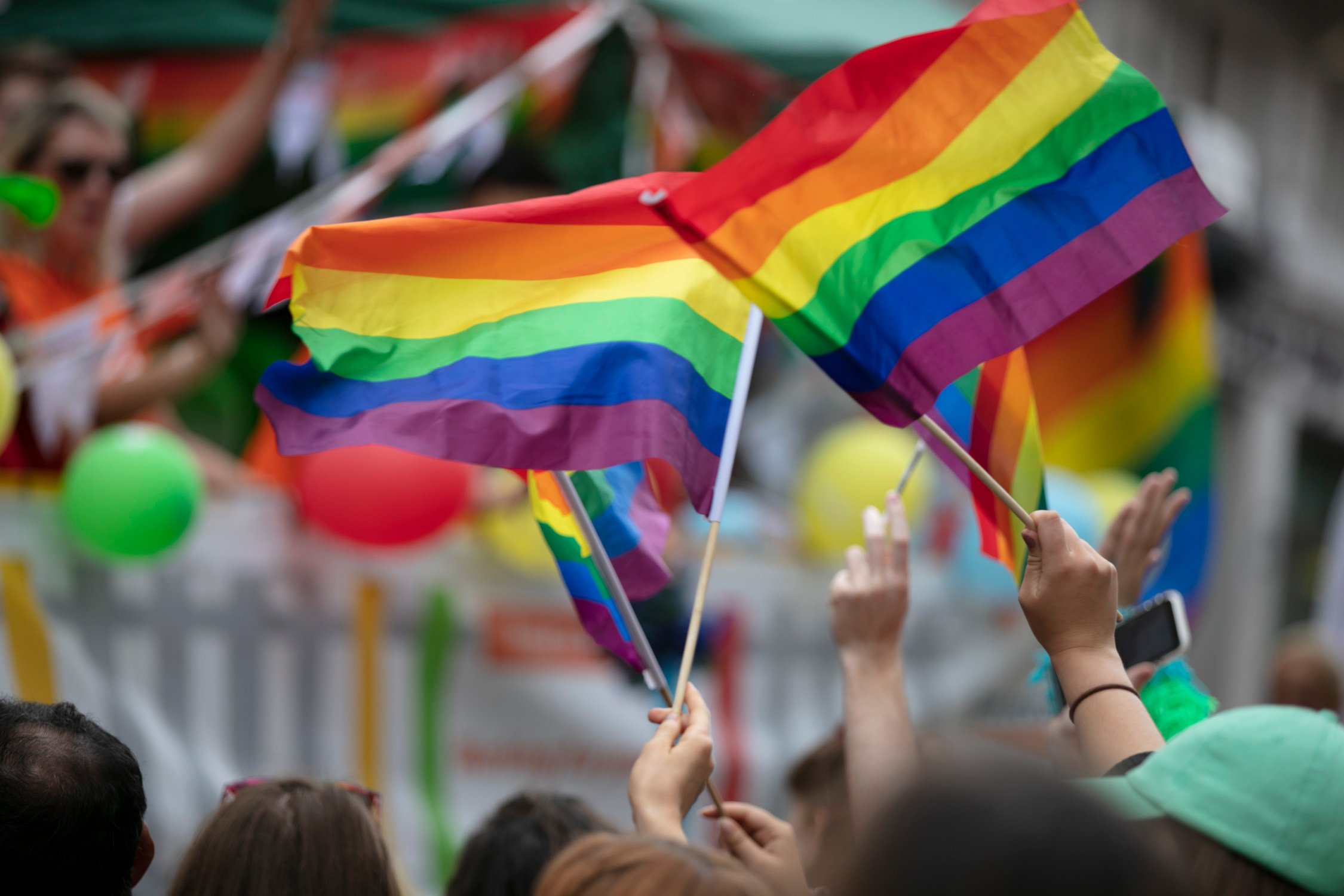 Crowd Waving Pride Flags 